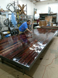 Mike putting the first coat of sealer, one of MANY!!